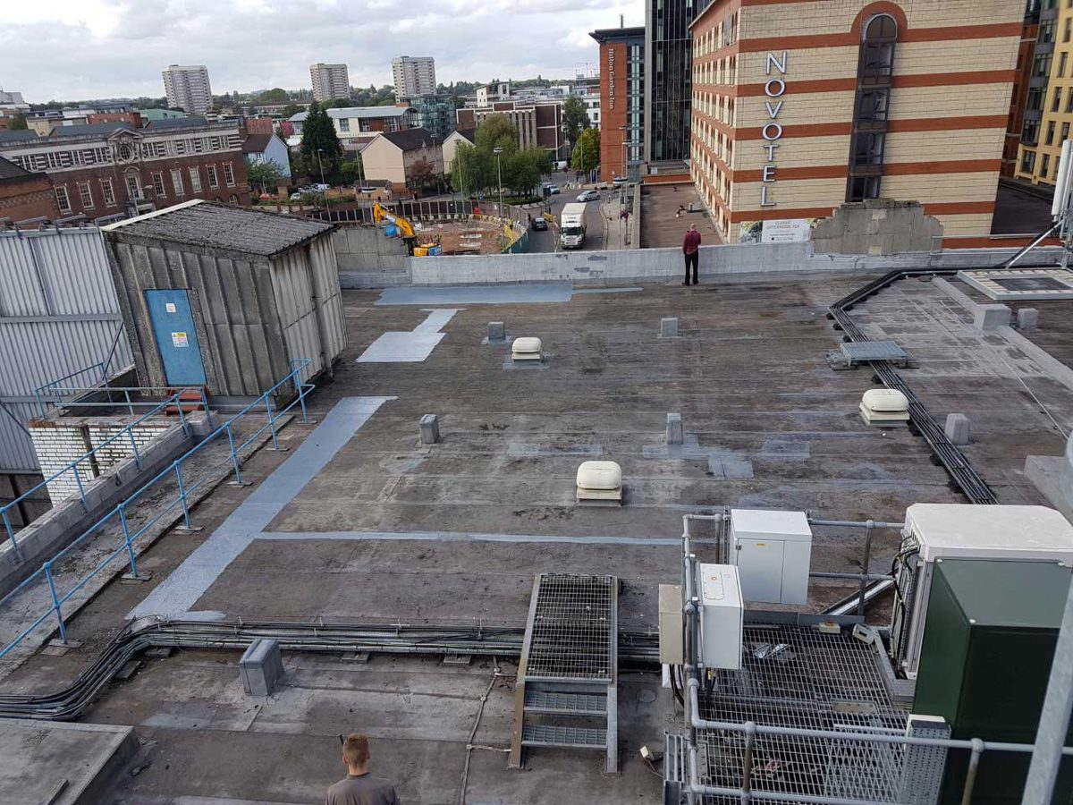 Commercial flat roof inspected by J5 Roofing