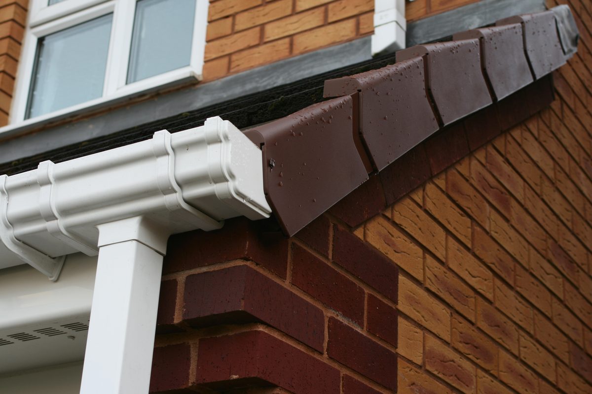 New guttering and dry verge installed on a brick home